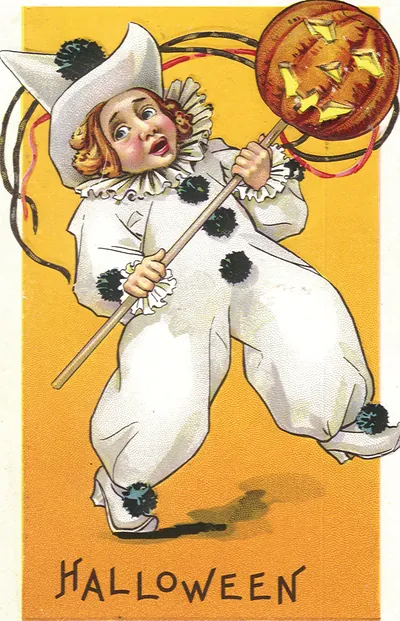 Halloween postcard of child in Pierrot costume holding jack-o'-lantern