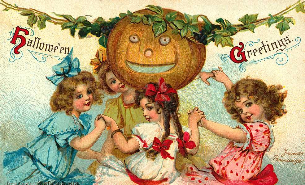 Hallowe'en Greetings: girls dancing around a jack-o'-lantern, Early 1900s — vintage postcard