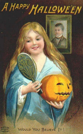 A Happy Hallowe'en: a girl with a mirror and jack-o'-lantern, Early 1900s — vintage postcard