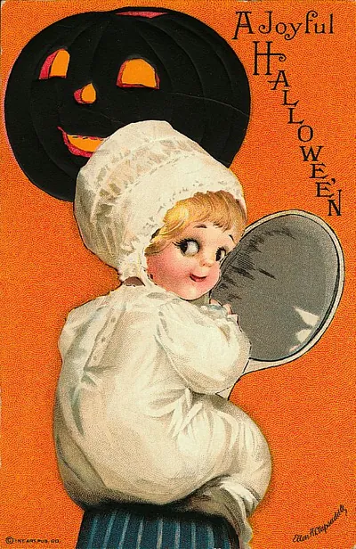 A Joyful Hallowe'en: a child with a black jack-o'-lantern