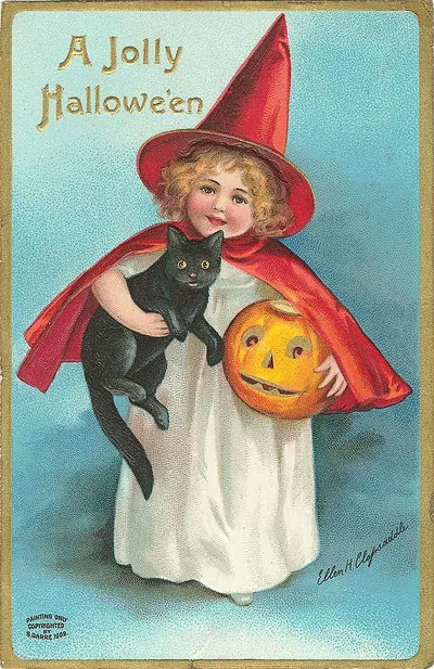 A Jolly Hallowe'en: a little witch with a black cat and jack-o'-lantern