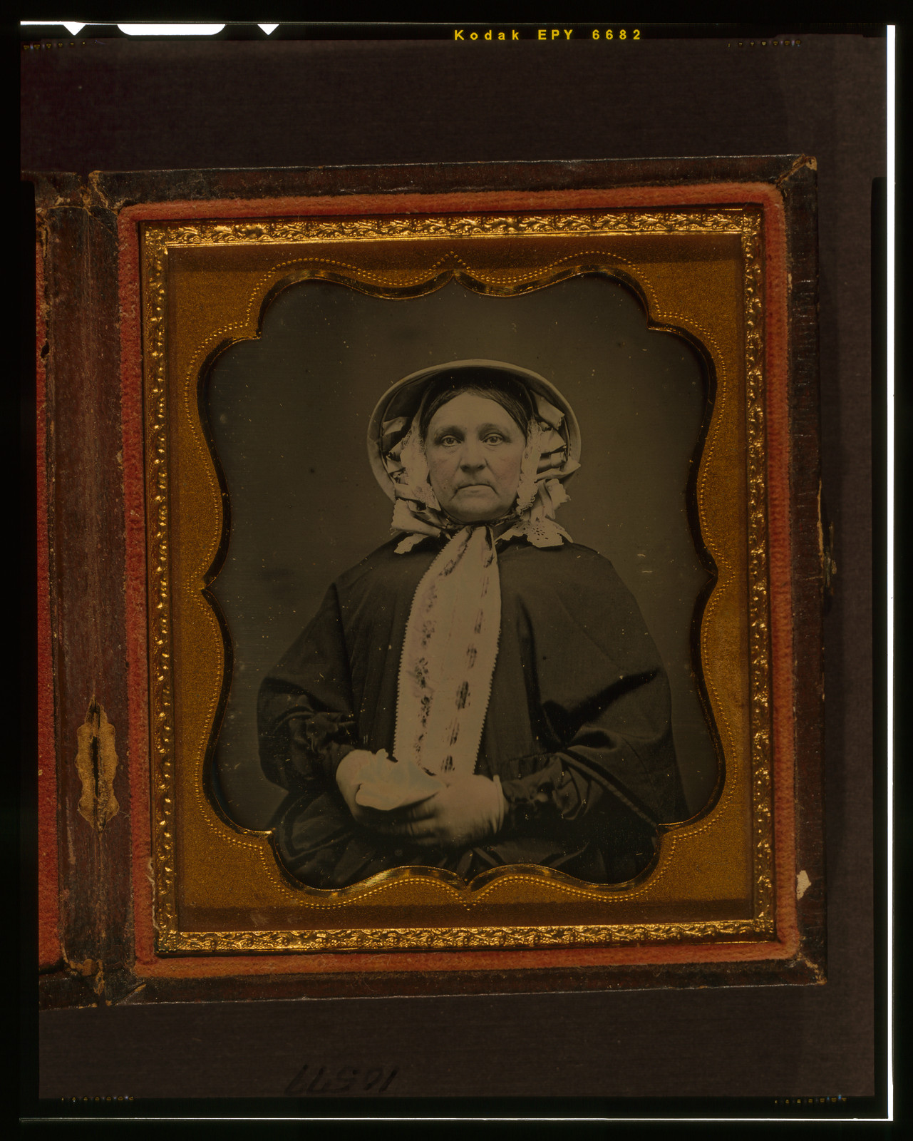 Unidentified woman in bonnet and shawl, framed daguerreotype, 1840 — historic photograph
