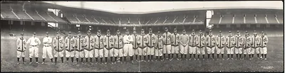 Panoramic photograph of a baseball team in stadium, Cleveland uniforms