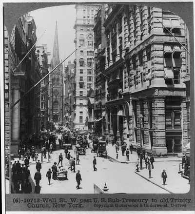 Wall St. W. past U.S. Sub-Treasury to old Trinity Church, New York