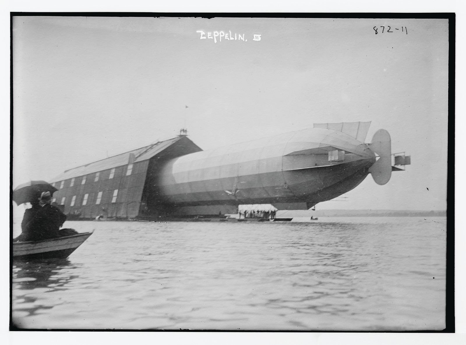 Blimp, Zeppelin No. 3, in shed, seen from water, n/a — historic photograph