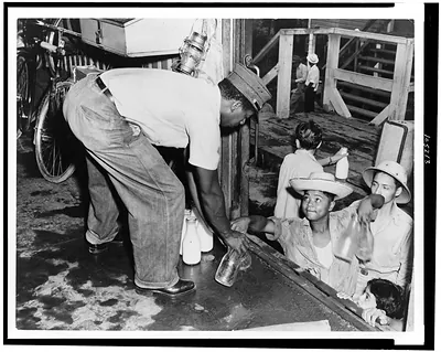 Tela Railroad Co. Honduras. Milk is delivered at Toloa farm
