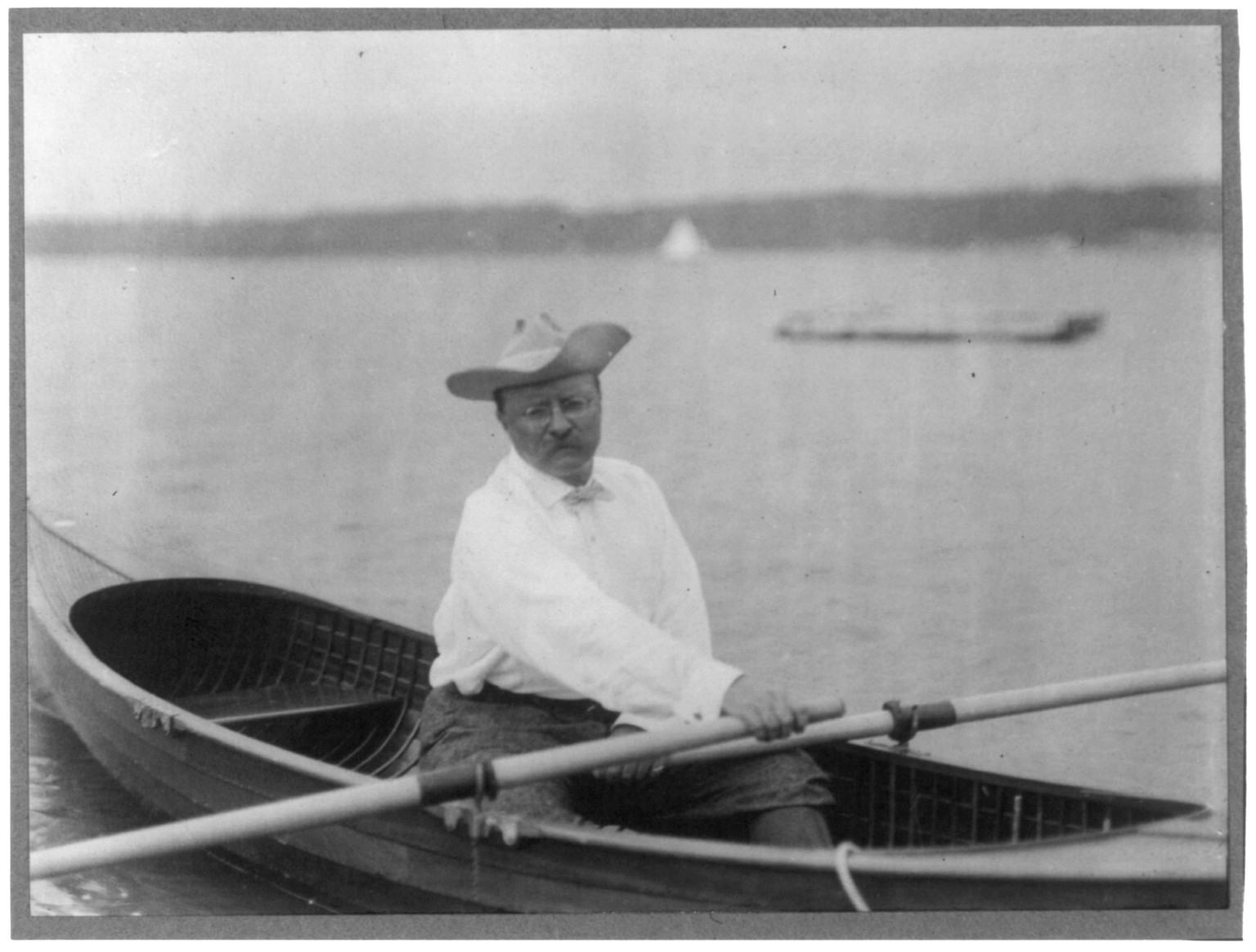 T. Roosevelt rowing, c1905 Sept. — historic photograph