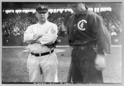 [Baseball players John J. McGraw of N.Y. and Frank Chance of Chicago National League baseball, standing beside each other on baseball field]
