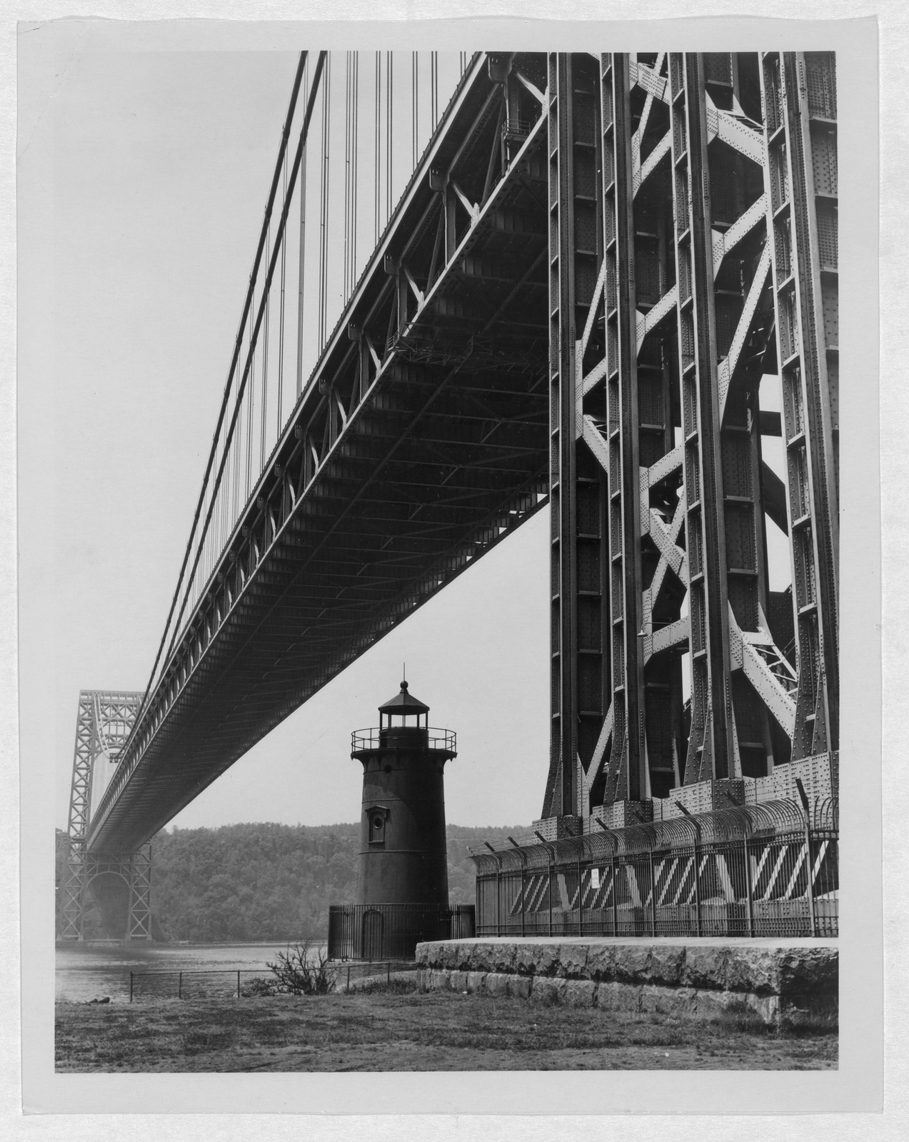 The George Washington Bridge with a lighthouse — historic image