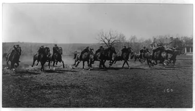 [U.S. Army cavalry soldiers: on running horses]