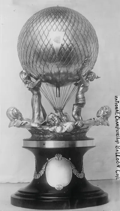 Silver balloon-shaped trophy cup with handwritten National Championship Balloon Cup label