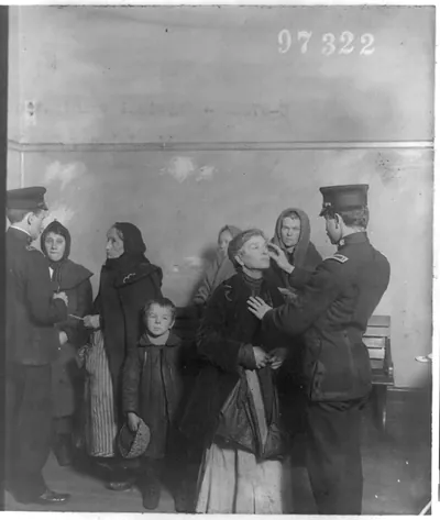 [Physical examination of female immigrants at Ellis Island, New York City]