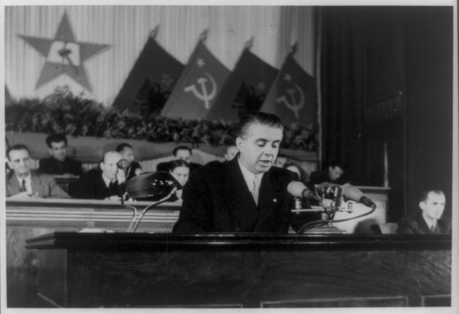 [Enver Hoxha addressing the delegates of the Fourth Congress of Albanian Trade Union], 1956 — historic photograph