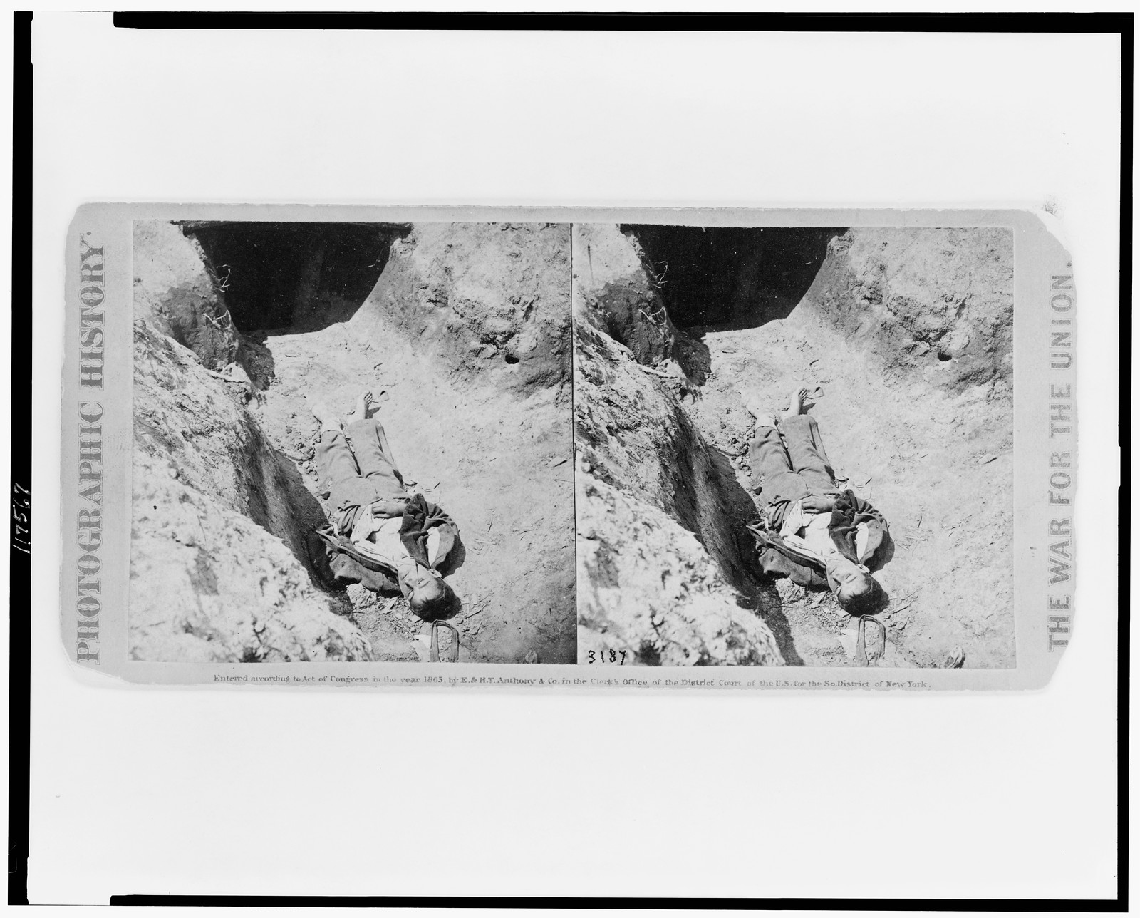[Confederate boy age 14 lies dead outside bomb proof in trenches of Fort Mahone], 1865 — historic photograph