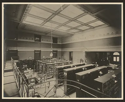 Bookroom interior of a Carnegie library, with coffered ceiling
