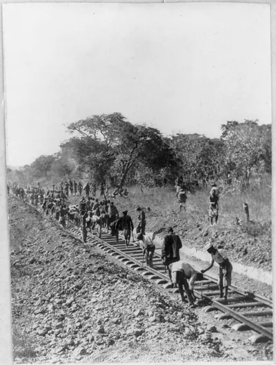 Man building railway planned by Cecil Rhodes near Broken Hill, Rhodesia