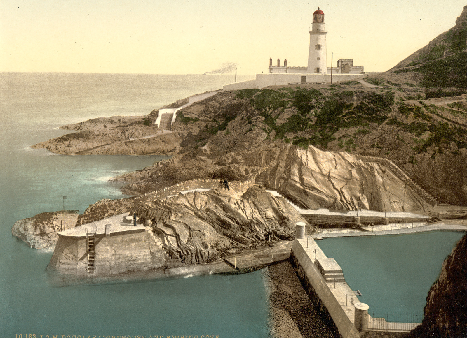 Douglas Lighthouse and bathing cove Isle of Man England, [between ca. 1890 and ca. 1900]. — historic print