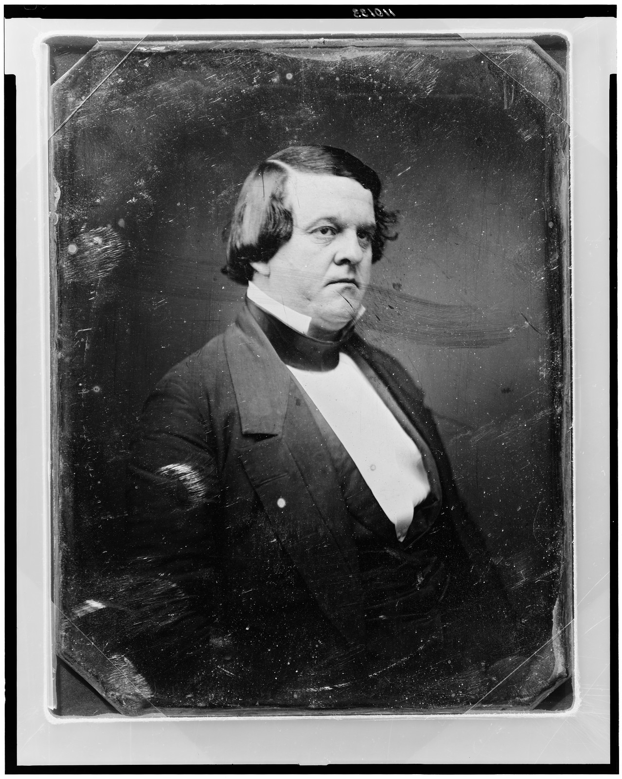 Half-length daguerreotype portrait of a man in dark coat, 1844 — historic photograph