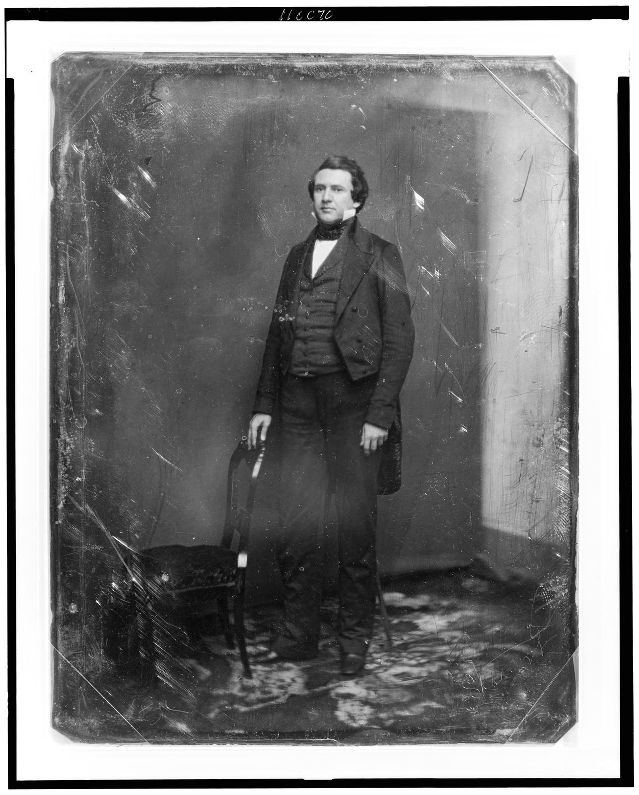 [Alexander Hugh Holmes Stuart, full-length portrait, standing slightly to the left, one hand resting on the back of a chair; studio background showing prominently], [between 1844 and 1860] — historic photograph