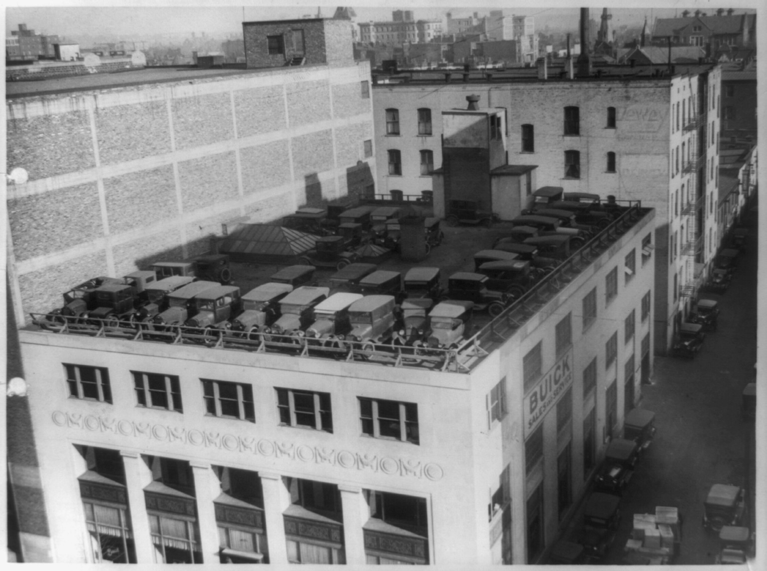 [Automobiles parked on roof of Buick Sales and service building], 1925 Dec. 12. — historic photograph