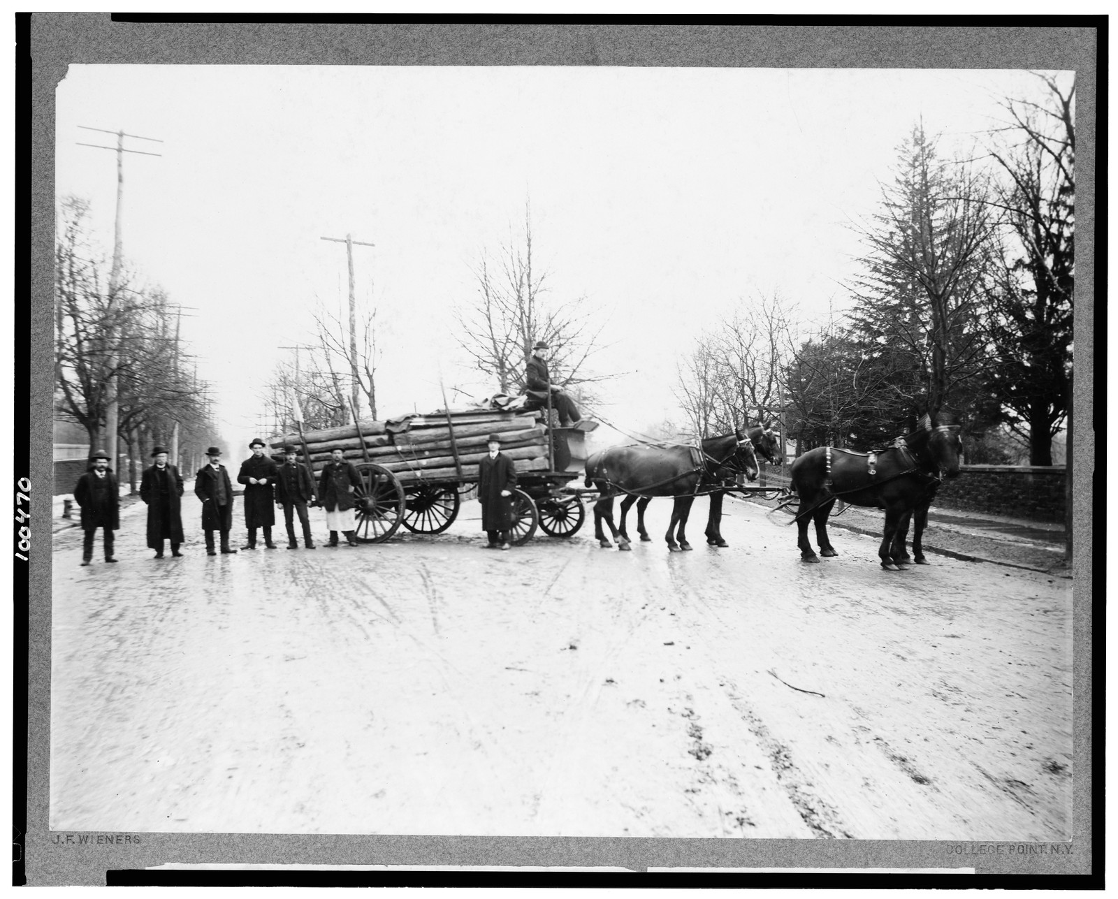 The removal of the original Abraham Lincoln log cabin from College Point, N.Y., on February 21, 1906, to be re-erected on the Lincoln farm at Hodgenville, Kentucky, the birthplace of the martyred president / J.F. Wieners, College Point, N.Y., 1906 February 21, c1906. — historic photograph