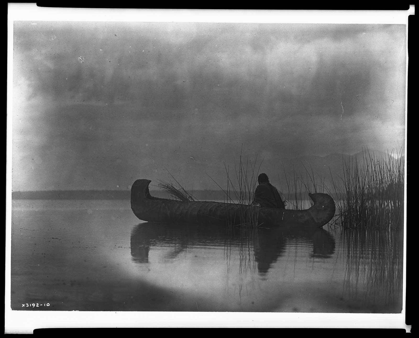 Kutenai duck hunter, c1910 March 11. — historic photograph