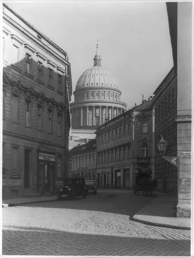 [Potsdam, Germany; looking down street toward dome of St. Nicholas church]