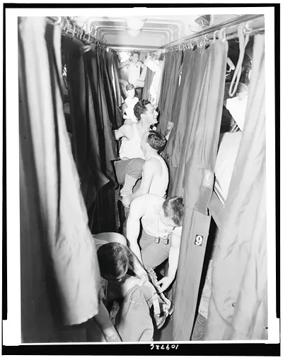 [U.S. soldiers undressing in Pullman car] / photo by Pullman Company.