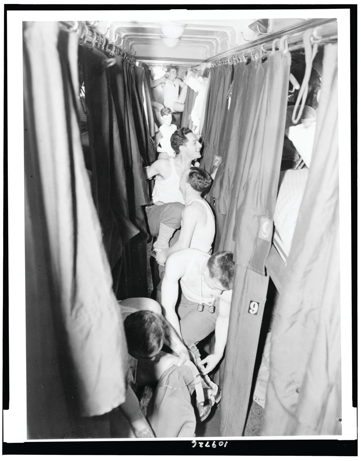 [U.S. soldiers undressing in Pullman car] / photo by Pullman Company., [1942(?)] — historic photograph