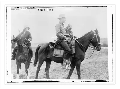 Robt. Taft with others riding horses