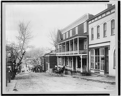 [Street view, with Mansion Inn in foreground, Luray, Virginia]