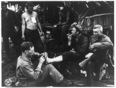 1st Lt. Paul Maurer treating patients in New Guinea / U.S. Army. Signal Corps.