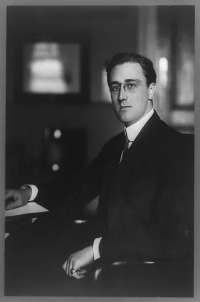 [Franklin Roosevelt, three-quarter length portrait, seated, facing left]