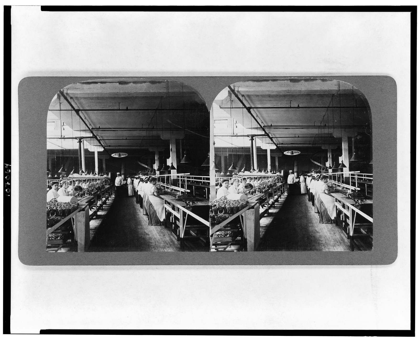 Packing sliced bacon in glass jars, Armours, Union Stock Yards, Chicago, U.S.A., c1909. — historic photograph
