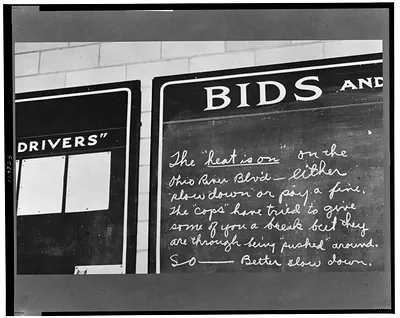 Pittsburgh, Pennsylvania. A warning on a blackboard in the drivers' room at the Greyhound garage