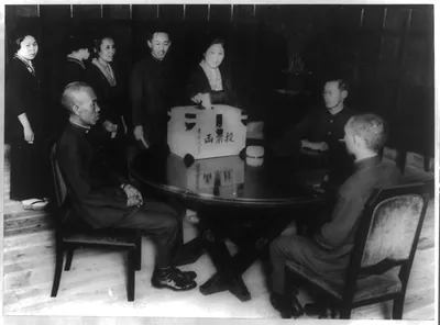 First step in women's suffrage in Japan - Minister of the Imperial Railroad (Heikichi?) Ogawa gives equal rights to women employees, Tokyo, Japan