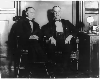 [Felix Frankfurter and Al Smith posed, seated, full lgth.]
