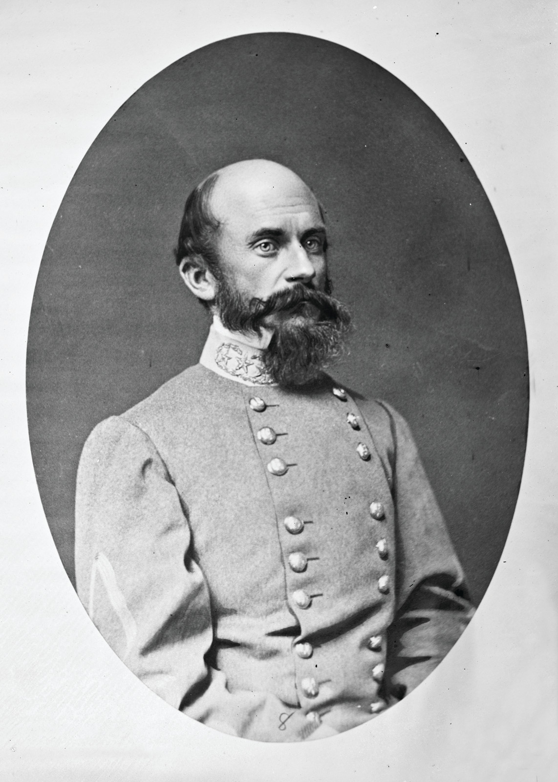 Bearded Confederate officer in oval portrait photograph — historic photograph