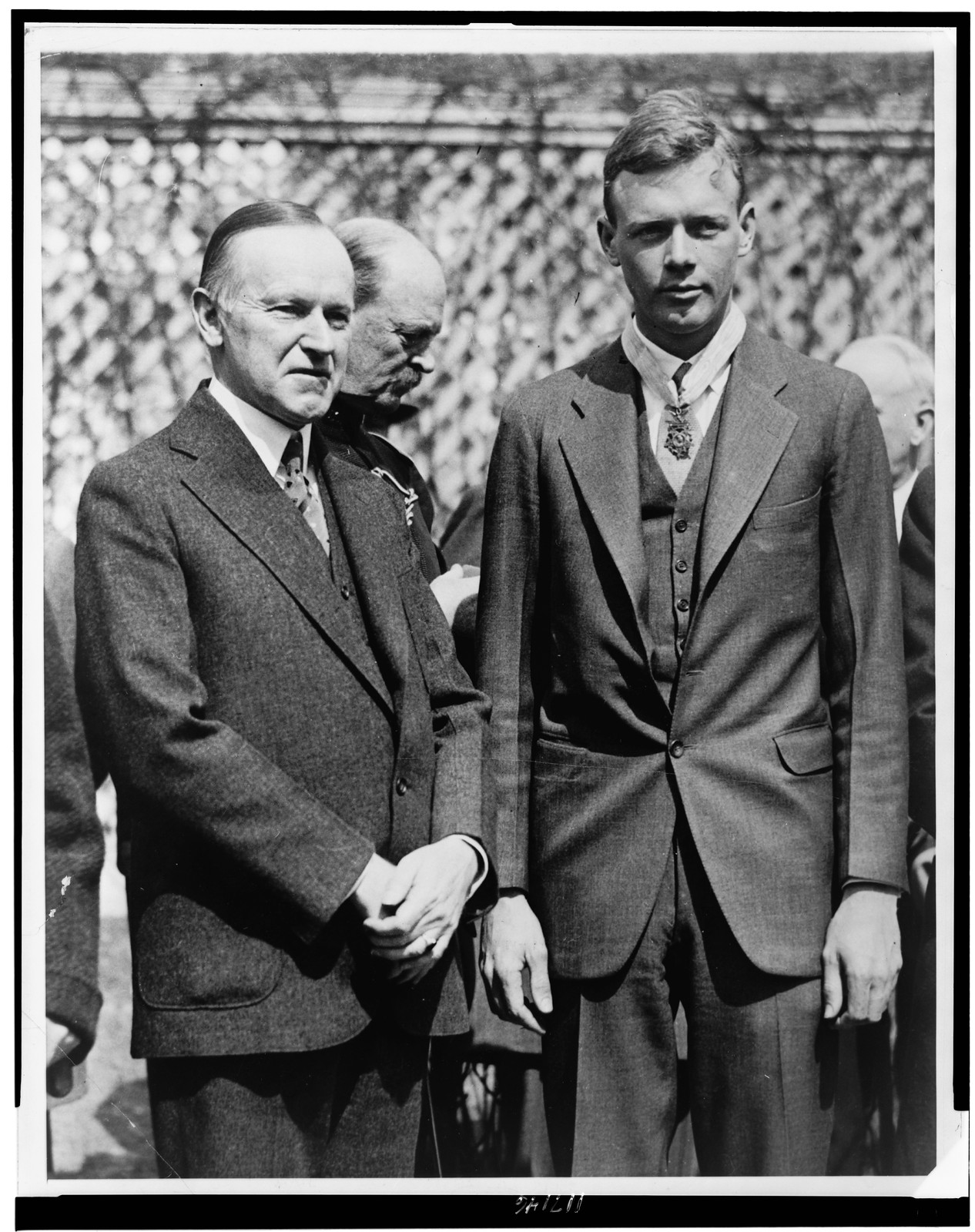 Lindbergh receives the Congressional Medal of Honor from President Coolidge — historic photograph