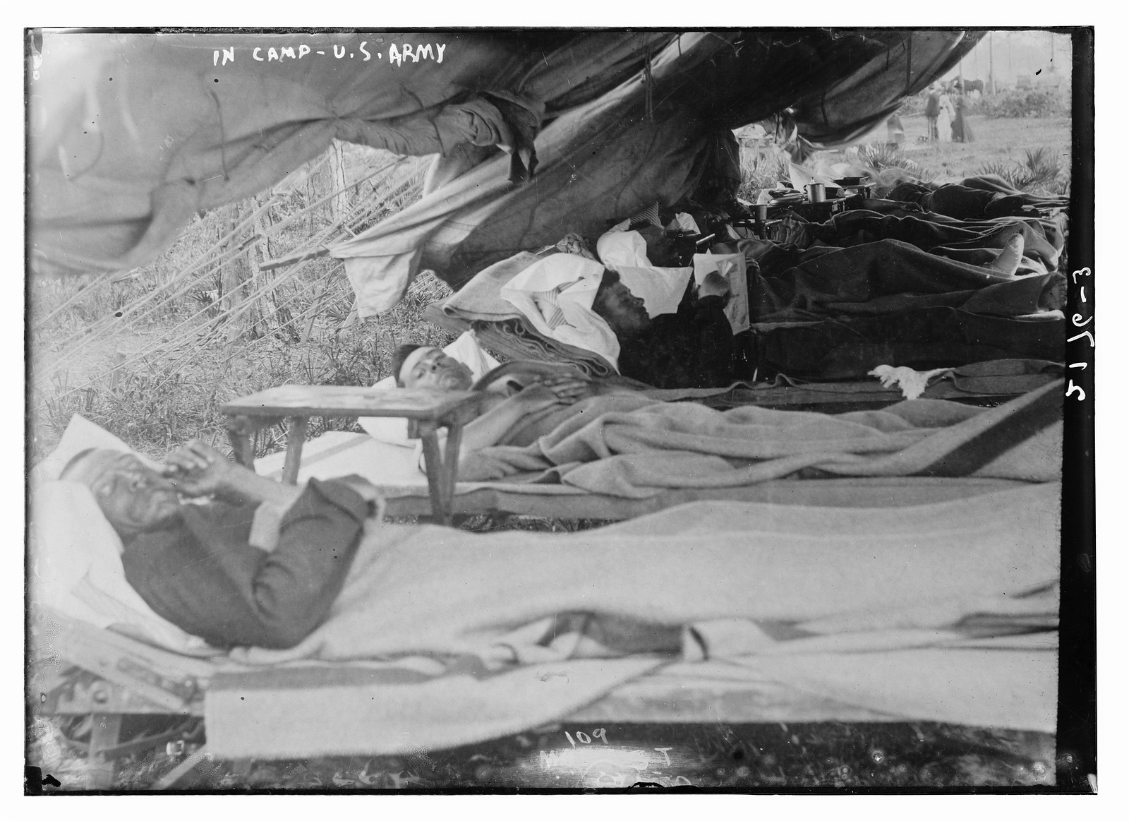 In camp, US Army, n/a — historic photograph