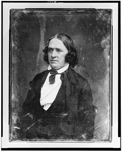 [John A. Dix, half-length portrait, three-quarters to the left, in civilian dress, with long hair]