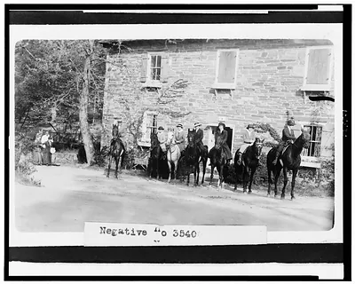 [Horseback riders in front of building in Rock Creek Park, Washington, D.C.]