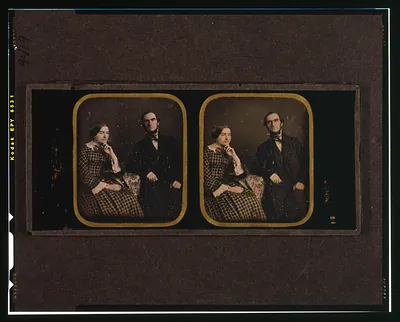 [John and Fanny Stevenson, three-quarters length, seated, with arms resting on table with tablecloth]