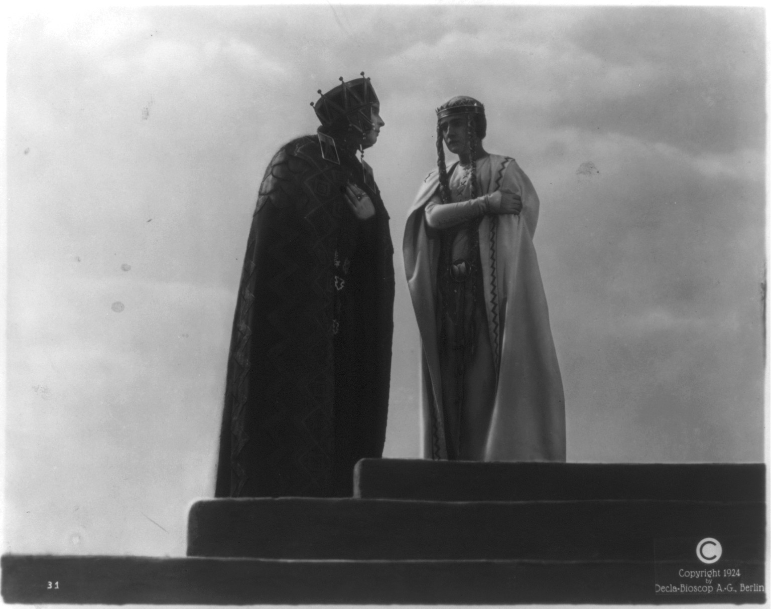 [Kriemhild and Brunhild on cathedral steps] — historic photograph