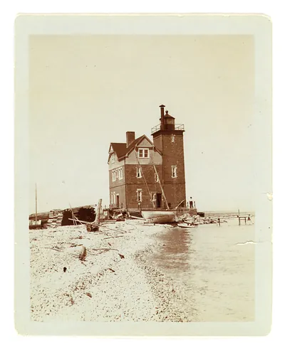 [View of lighthouse from beach, Duluth, Minn., 1903]