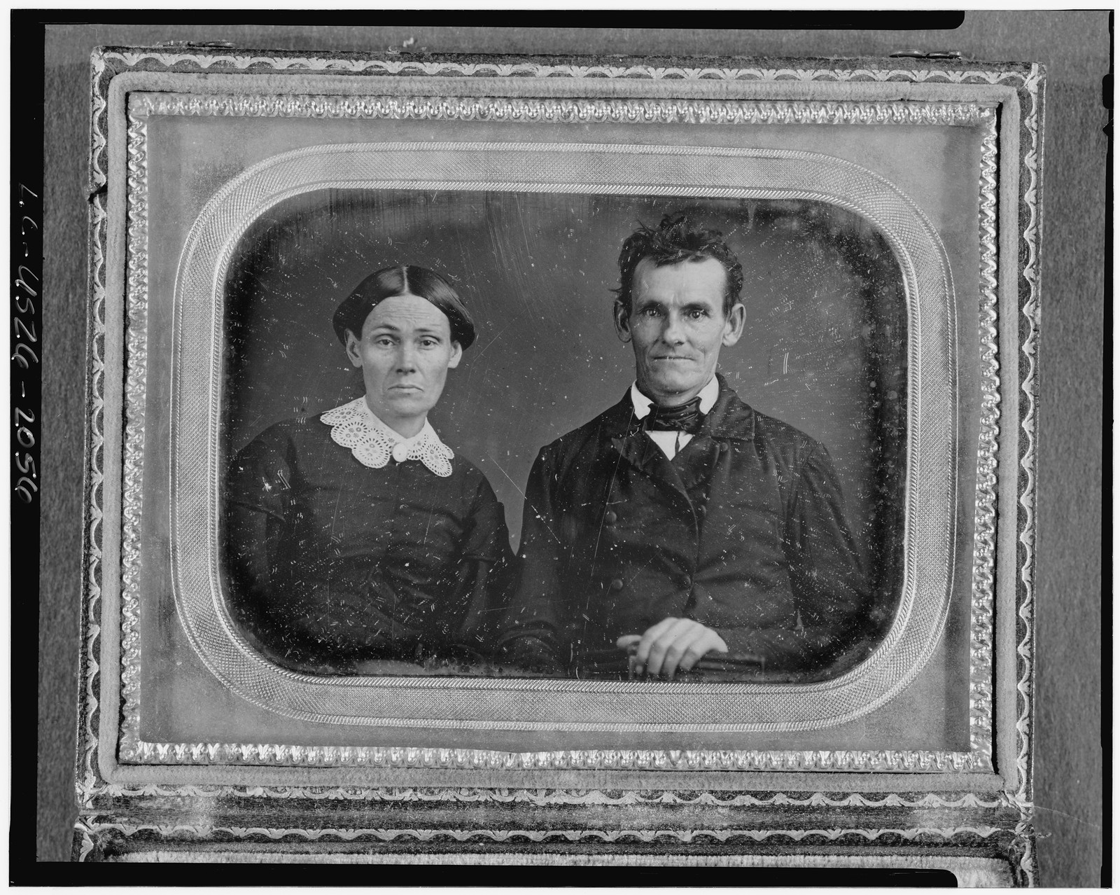 [Unidentified man and woman, head-and-shoulders portrait, facing front], [between 1840 and 1860] — historic photograph