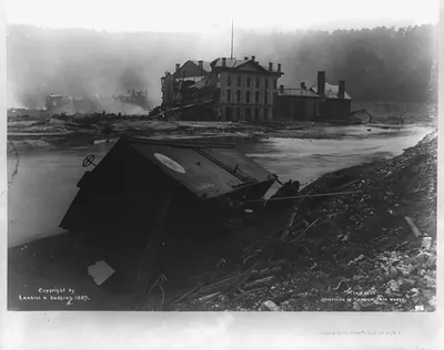 The flood, Johnstown, Pa., showing debris, warehouse of Cambria Iron Works