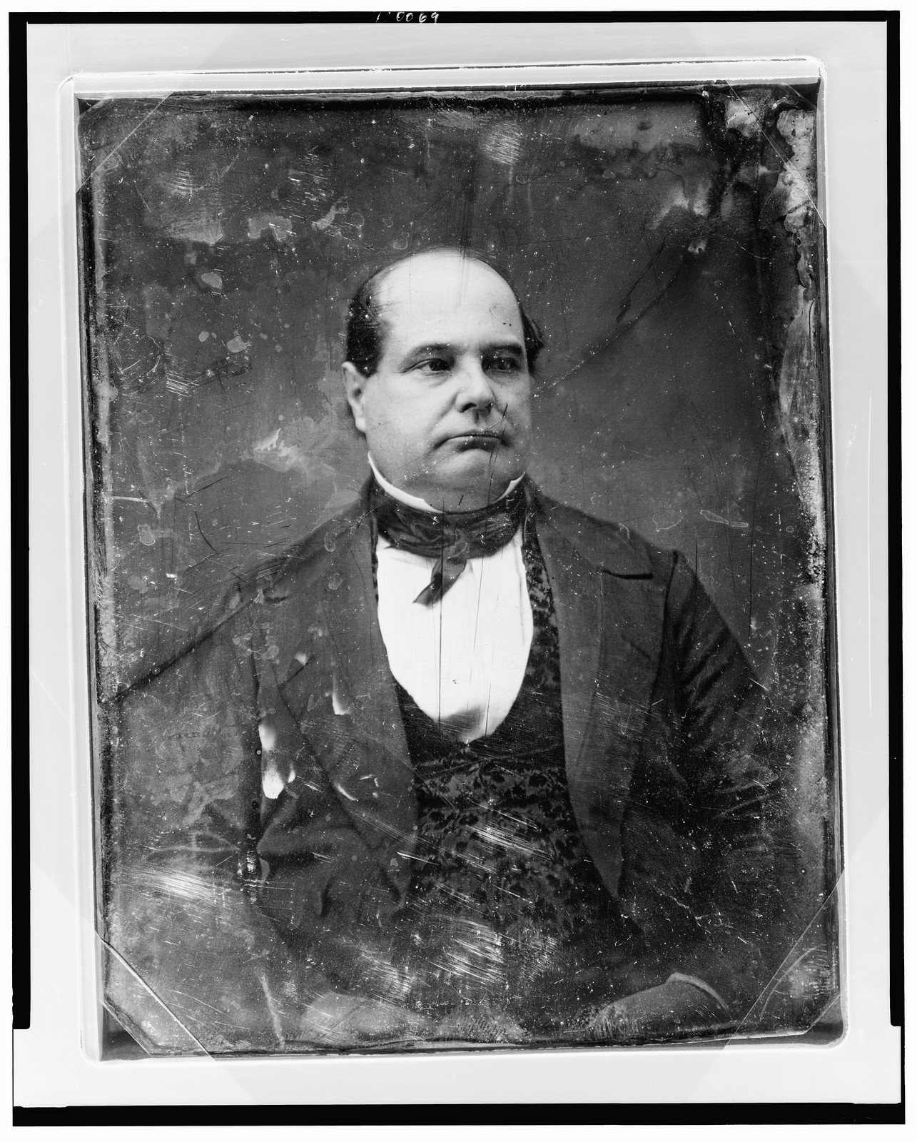 Daguerreotype portrait of a seated man in dark suit, 1844 — historic photograph