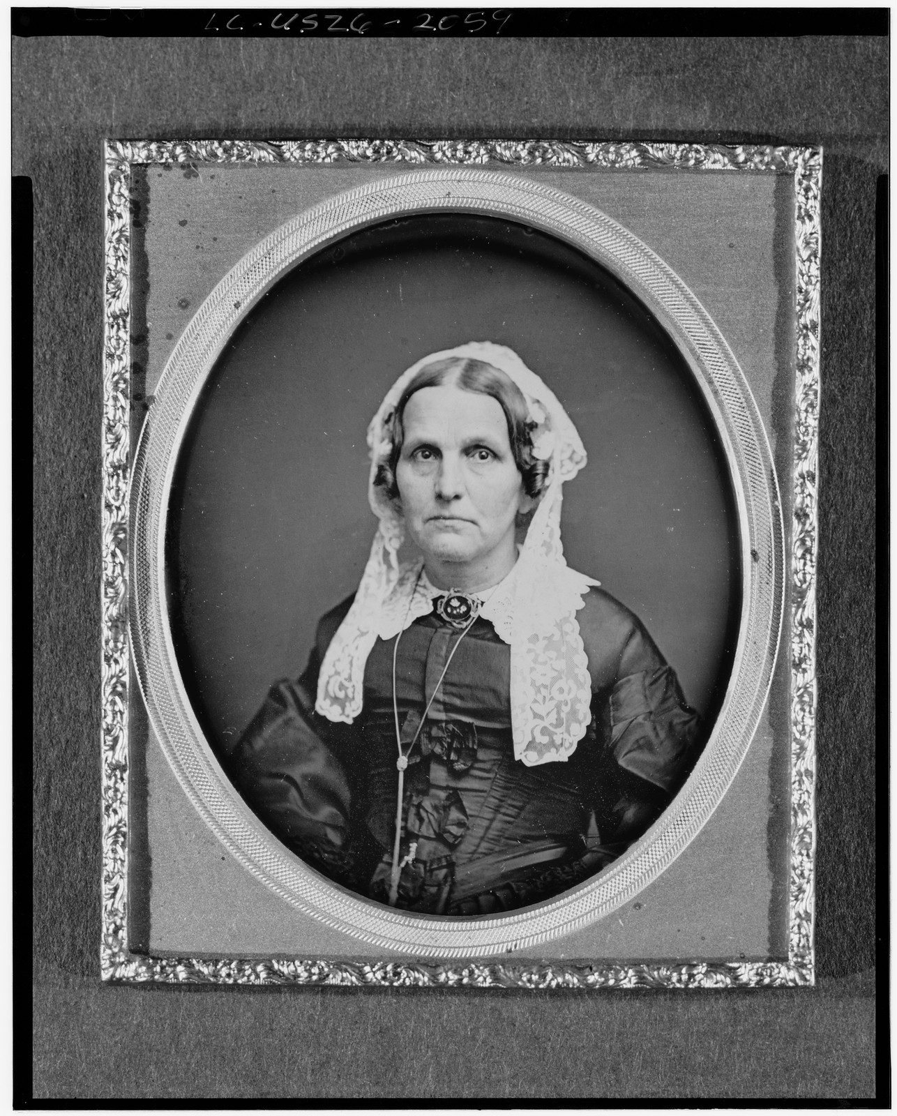 [Mrs. Miller, head-and-shoulders portrait of a woman, facing front], [between 1840 and 1860] — historic photograph