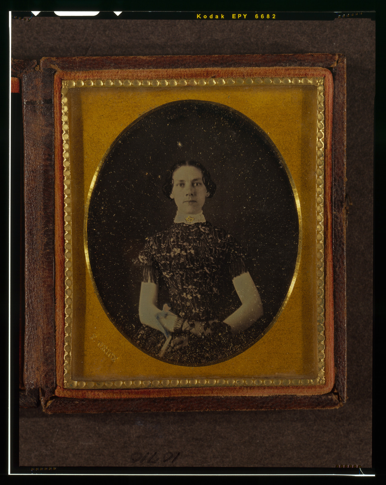 Half-length daguerreotype portrait of a woman in a case, 1855 — historic photograph